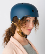 Lady wearing the Cyclechic 'Deco' Ladies Navy Blue Helmet
