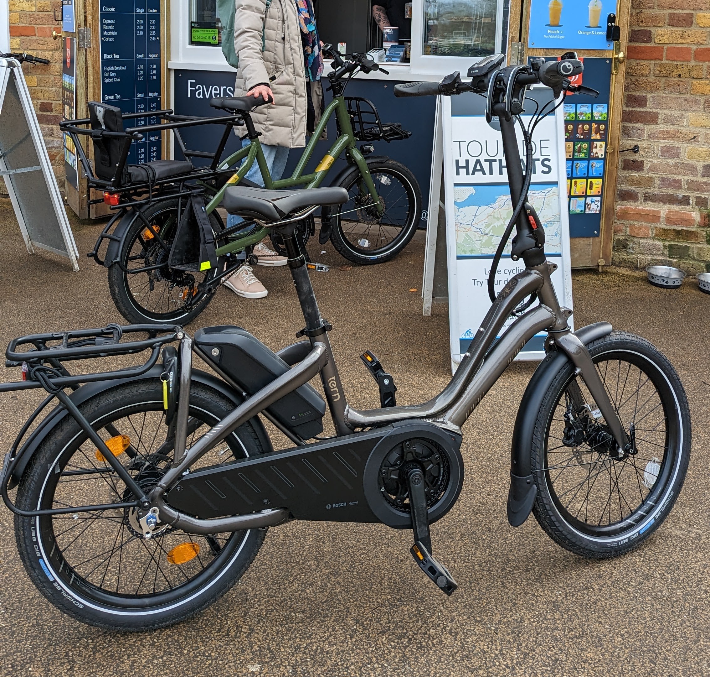 Tern NBD e-bike outside a coffee stall. 